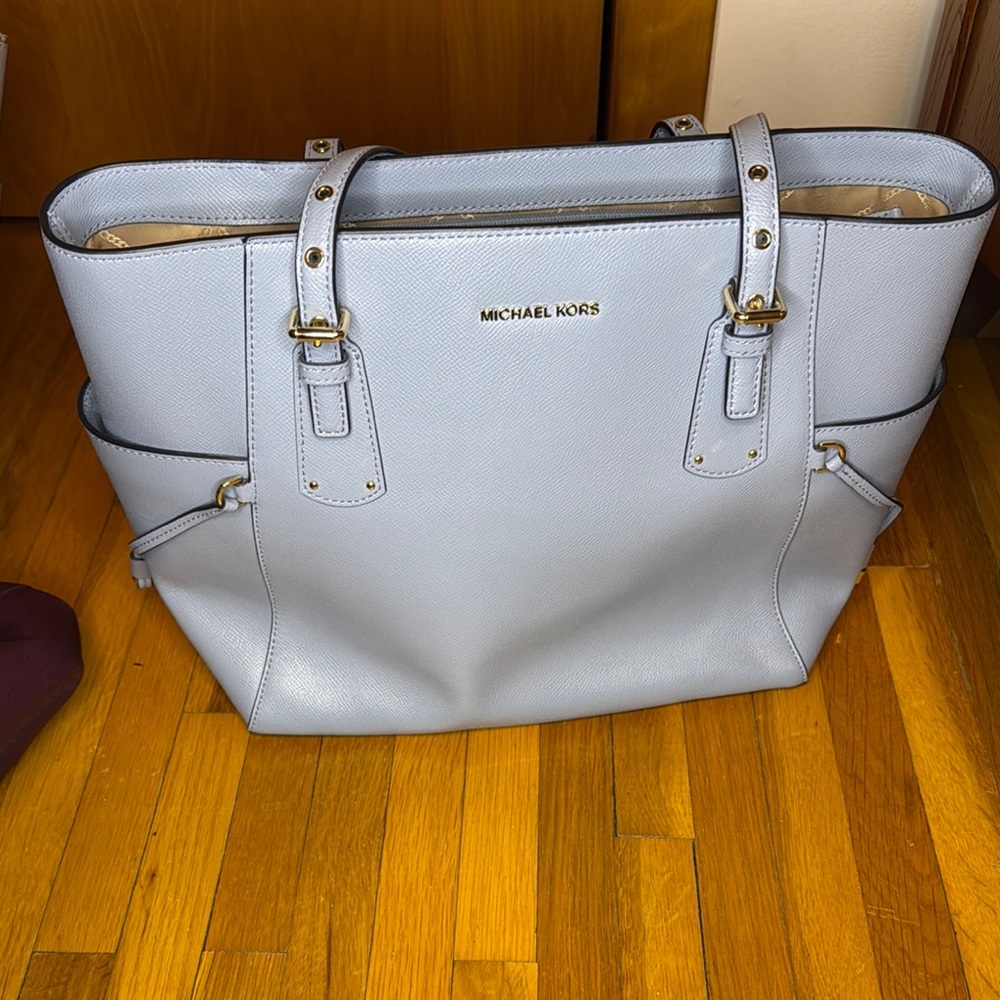 Michael Kors Blue Tote Bag with Spacious Design and Silver Hardware